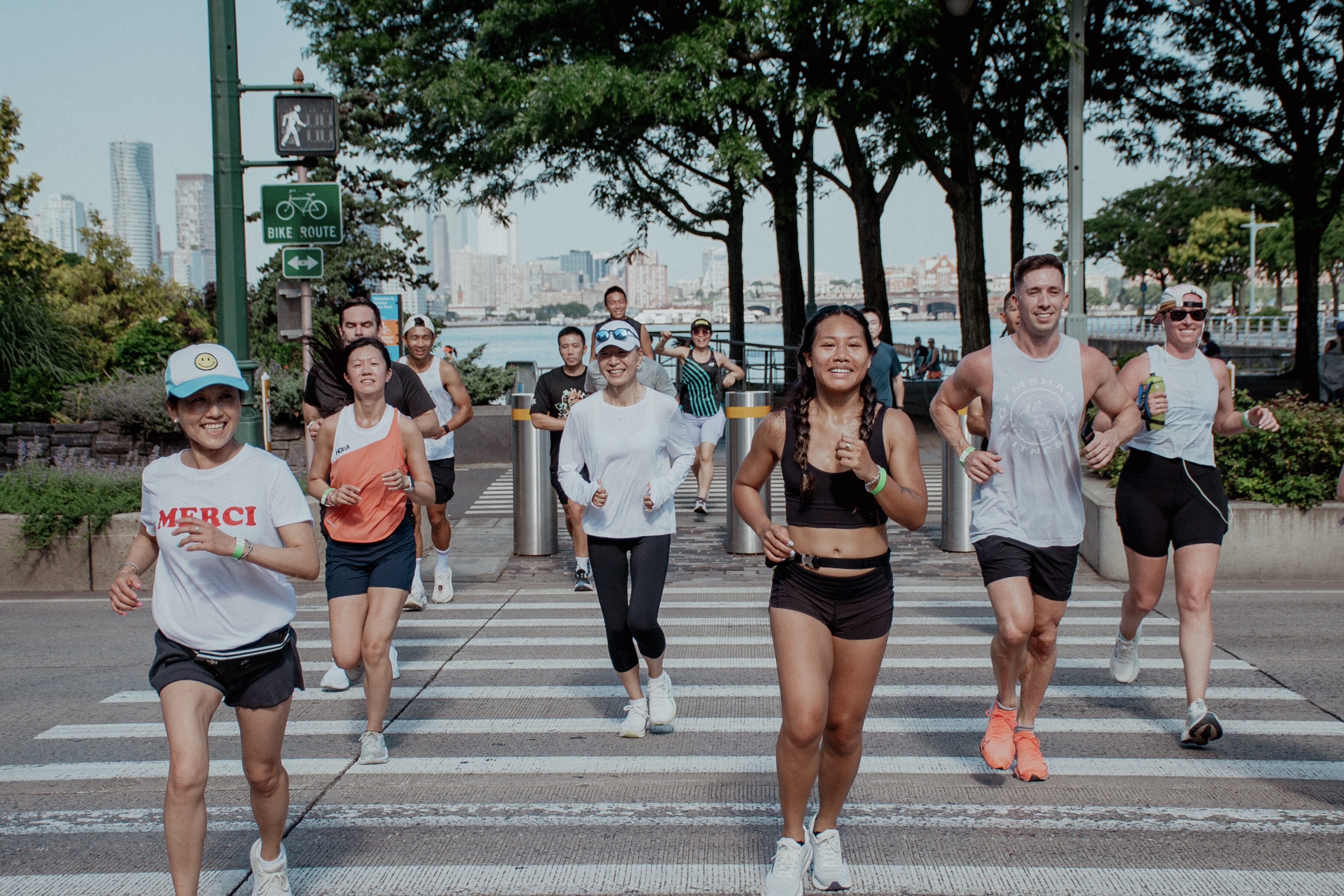 Proof runners moving together along the New York City waterfront